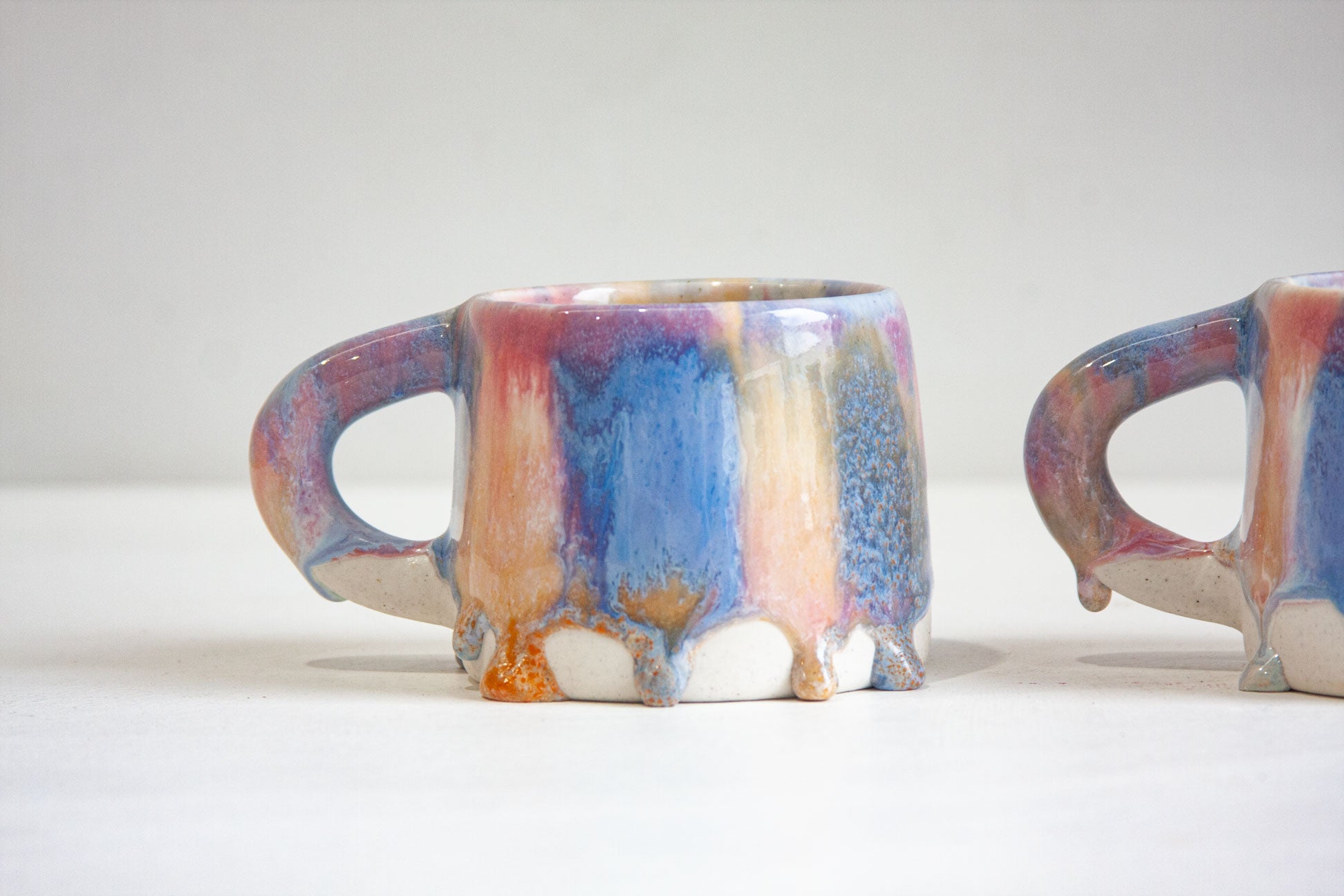 handmade ceramic mug with large glaze drips 