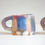 handmade ceramic mug with large glaze drips 
