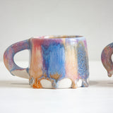 handmade ceramic mug with large glaze drips 