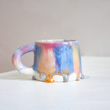 single handmade ceramic drippy glaze pink, blue and peach mug