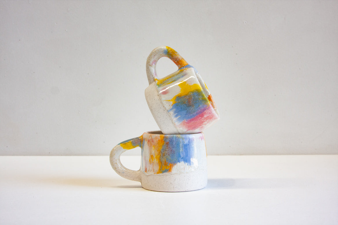 handmade ceramic yellow, pink, blue mug