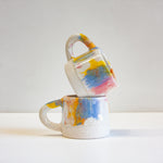 handmade ceramic yellow, pink, blue mug