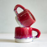 Handmade dark pink ceramic mug