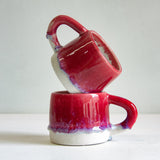 Handmade dark pink ceramic mug