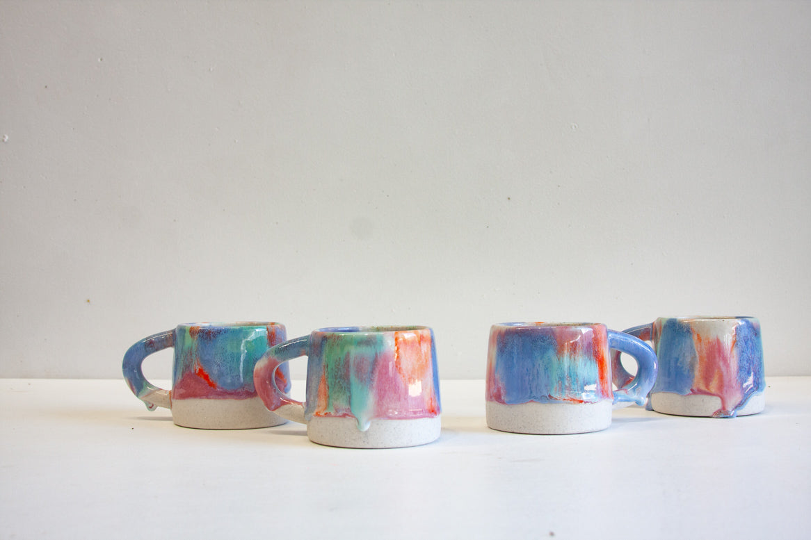 handmade ceramic pink, blue, orange and pink mug 