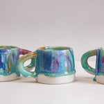 handmade ceramic green, blue, red and brown mug 
