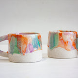 handmade ceramic orange, purple and green mug