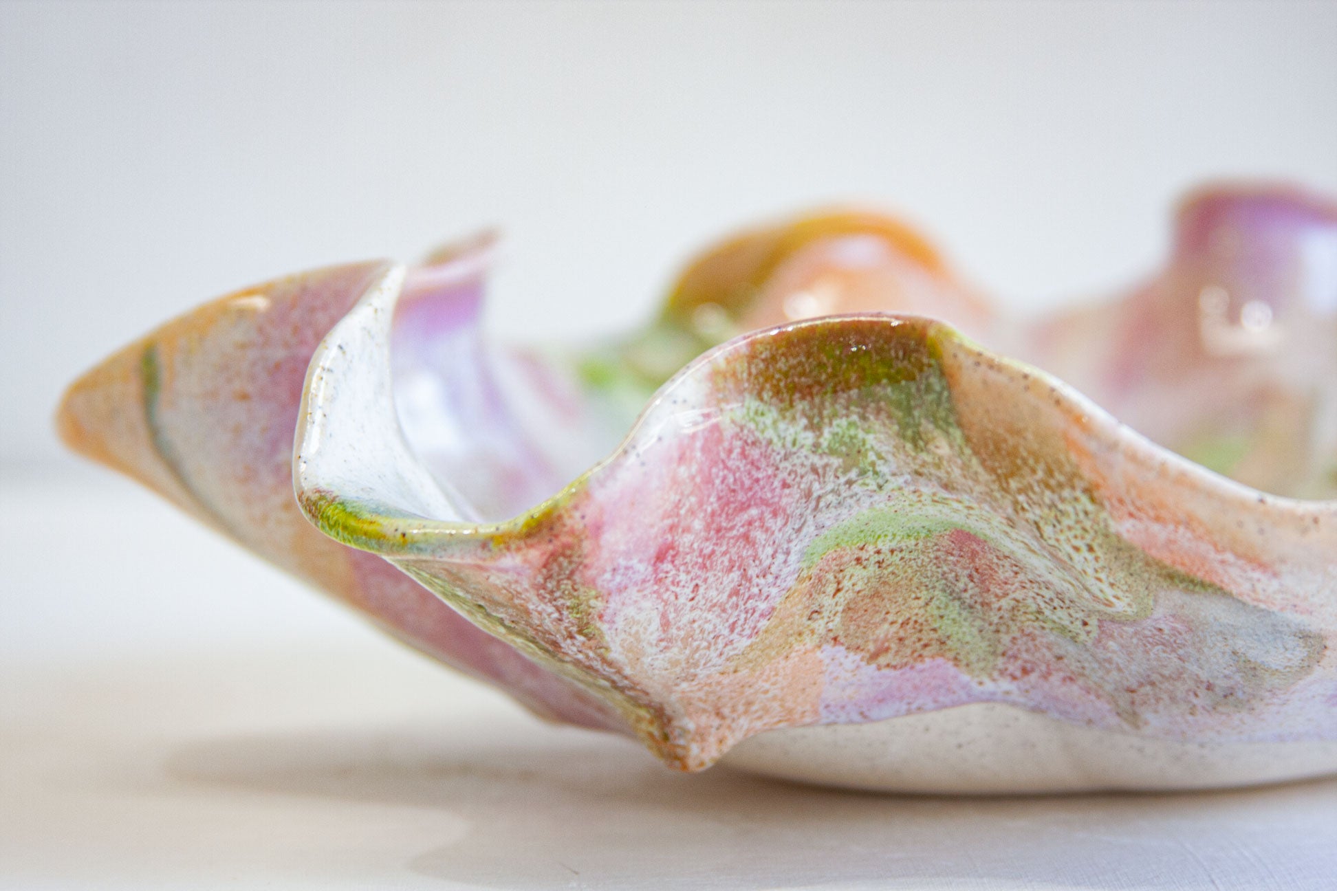 side view of glaze close up on handmade ceramic platter