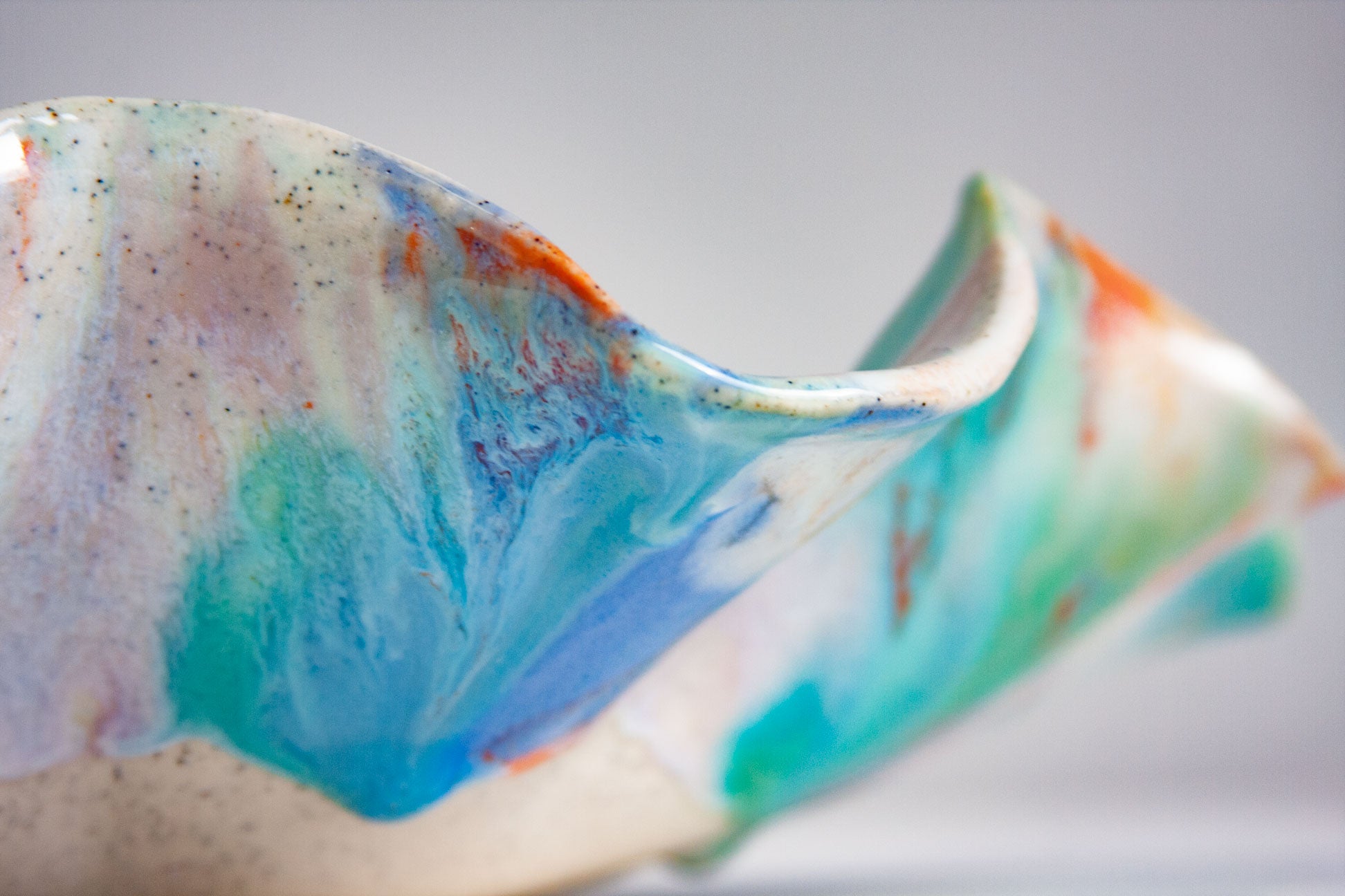 close up of the blue green glaze on ceramic platter
