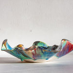 handmade ceramic decorative platter shown from the side