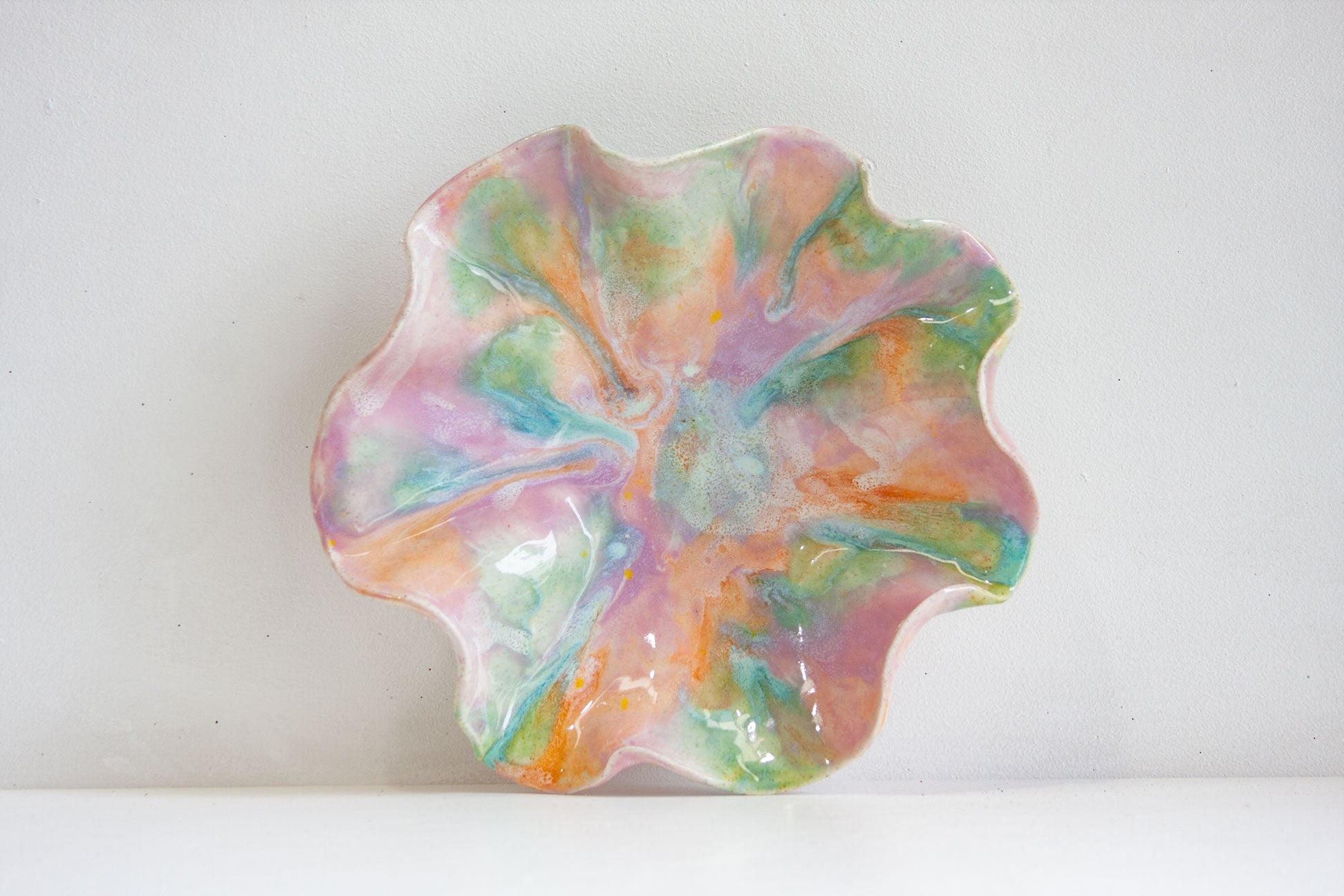 Colourful marbled oyster shaped platter.