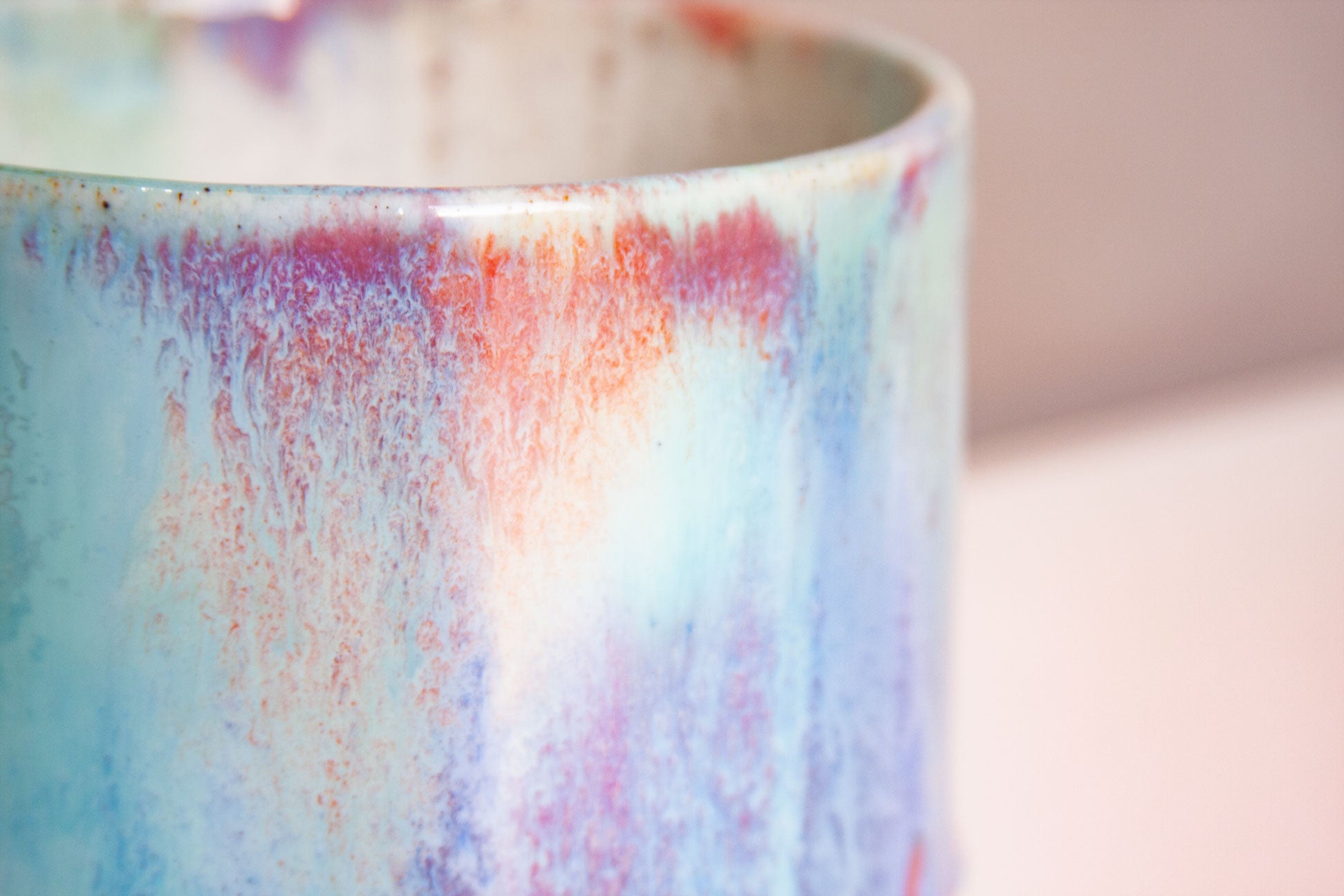 close up of glazed details on a ceramic planter.