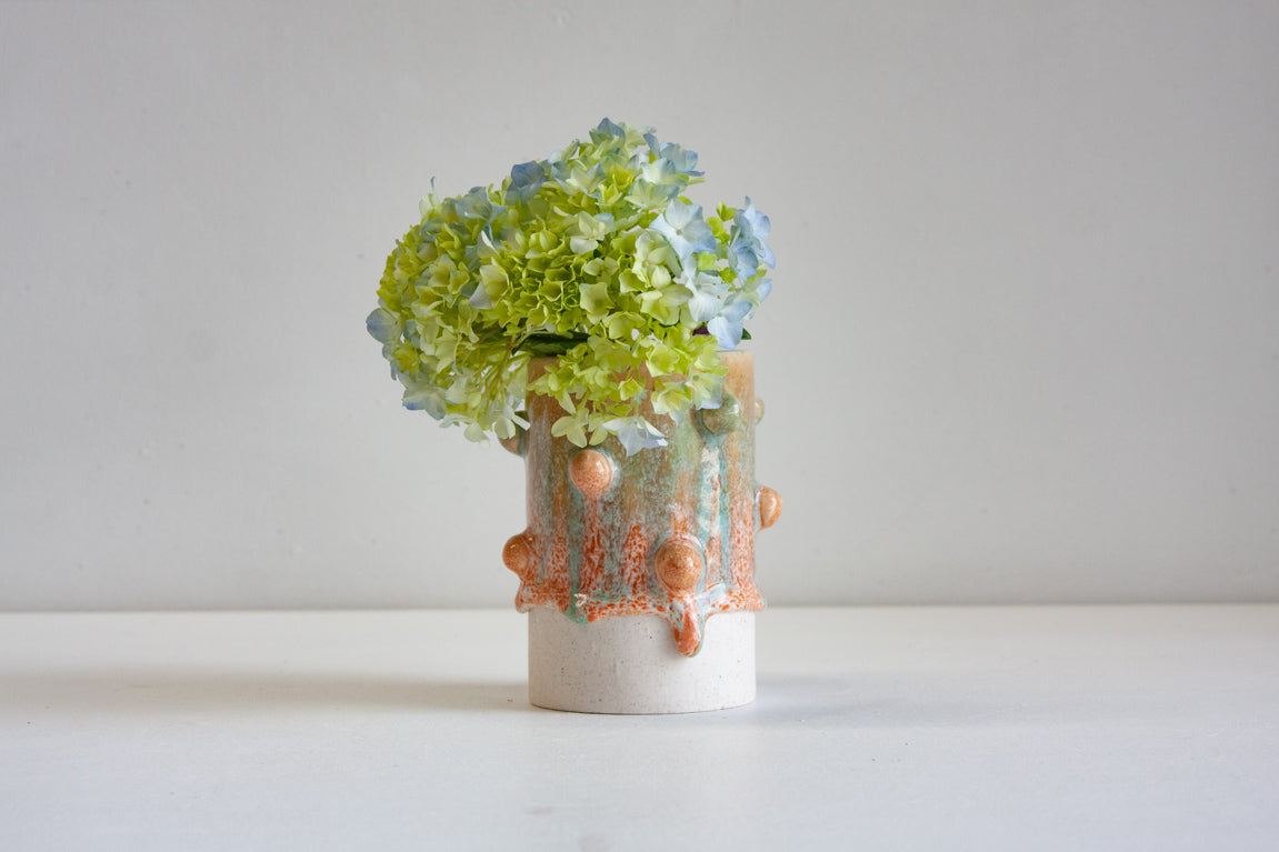 handmade ceramic green and peach bauble cylinder vase
