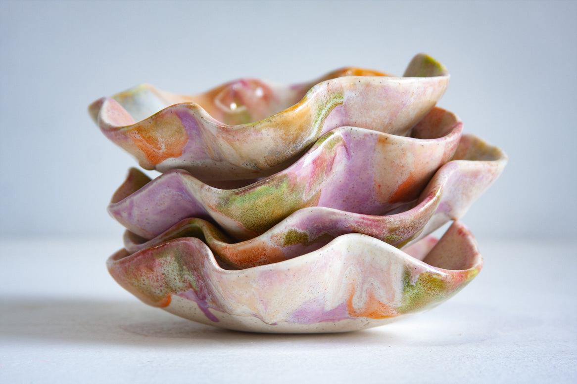 handmade ceramic sculptural small plate glazed in pastel pink, purple, peach and green