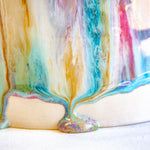 zoomed in photo of a glaze drip detail on handmade ceramic table lamp