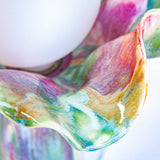 close up photo of the top to the table lamp showing the rippled edges