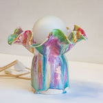 handmade ceramic table lamp glazed in pink, blue, green, peach and brown