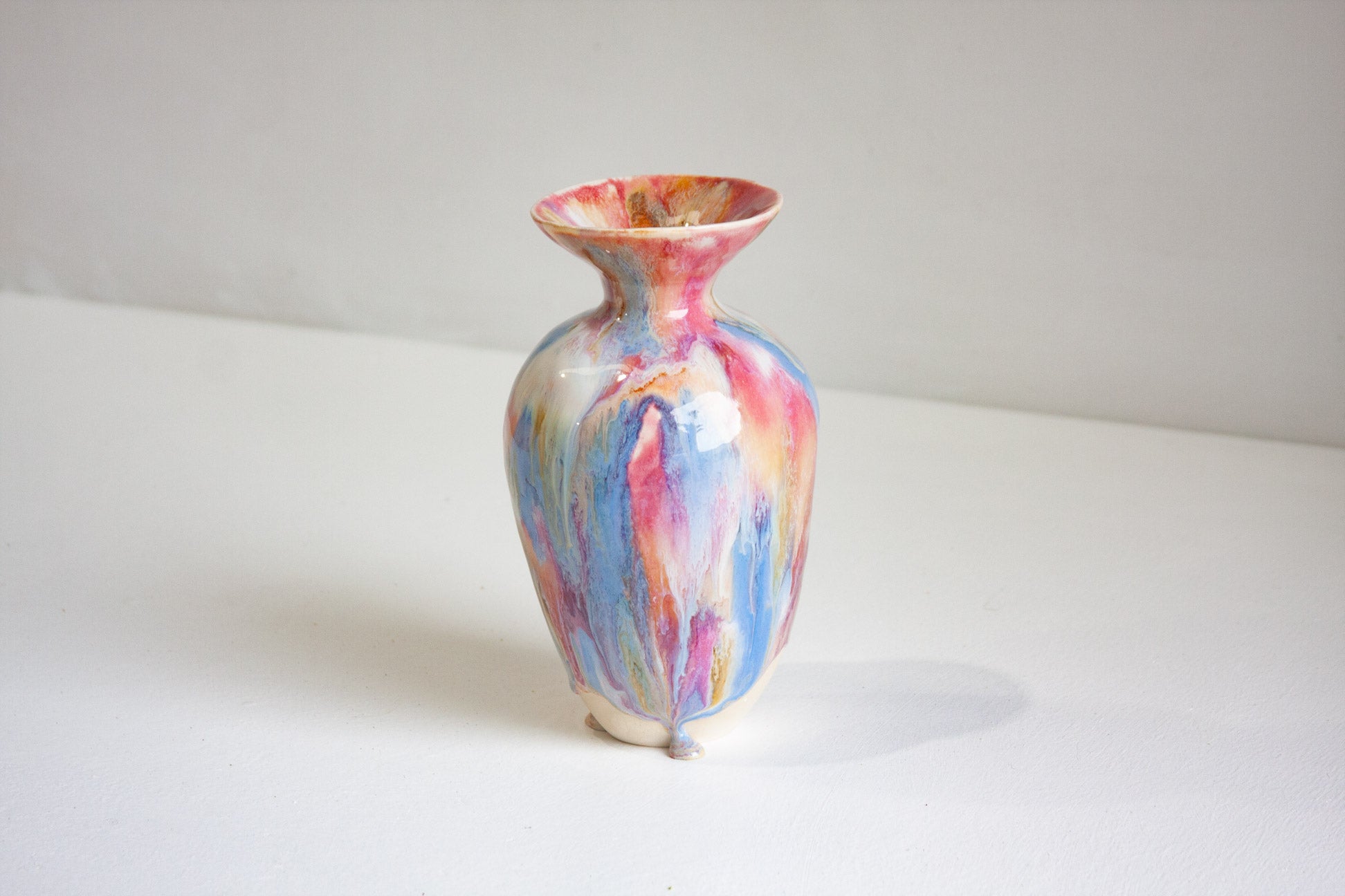 Multicolored vase on a white background