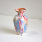 Multicolored vase on a white background