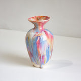 Multicolored vase on a white background