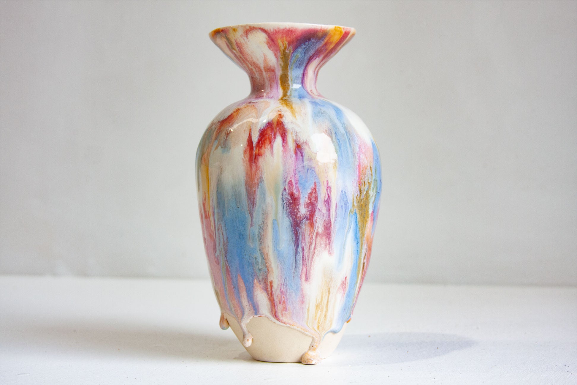 Multicolored vase on a white background