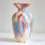 Multicolored vase on a white background