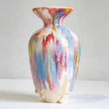 Multicolored vase on a white background