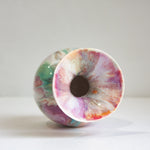 Colorful marbled ceramic bowl on a white background