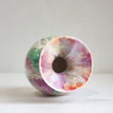 Colorful marbled ceramic bowl on a white background