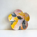 handmade ceramic yellow, purple, peach and purple flower shaped plate