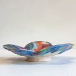 handmade ceramic blue, orange, purple flower shaped footed bowl