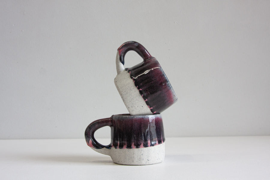 handmade dark blue and pink ceramic mug