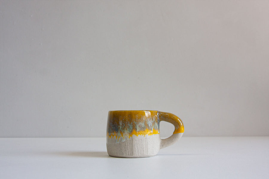 handmade ceramic yellow and blue mug